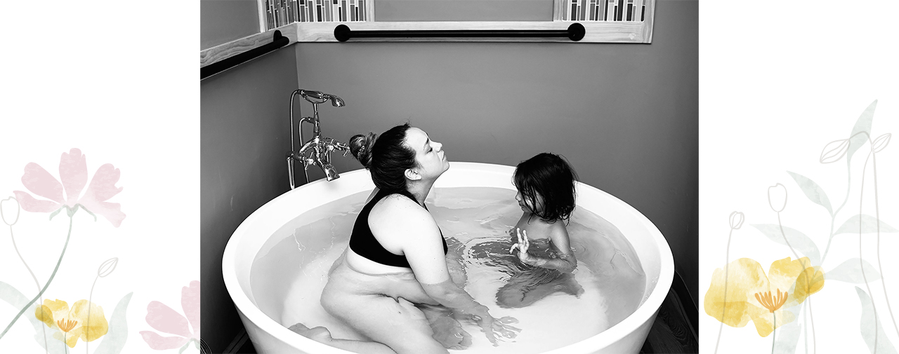 Mother and Child in Birthing Tub