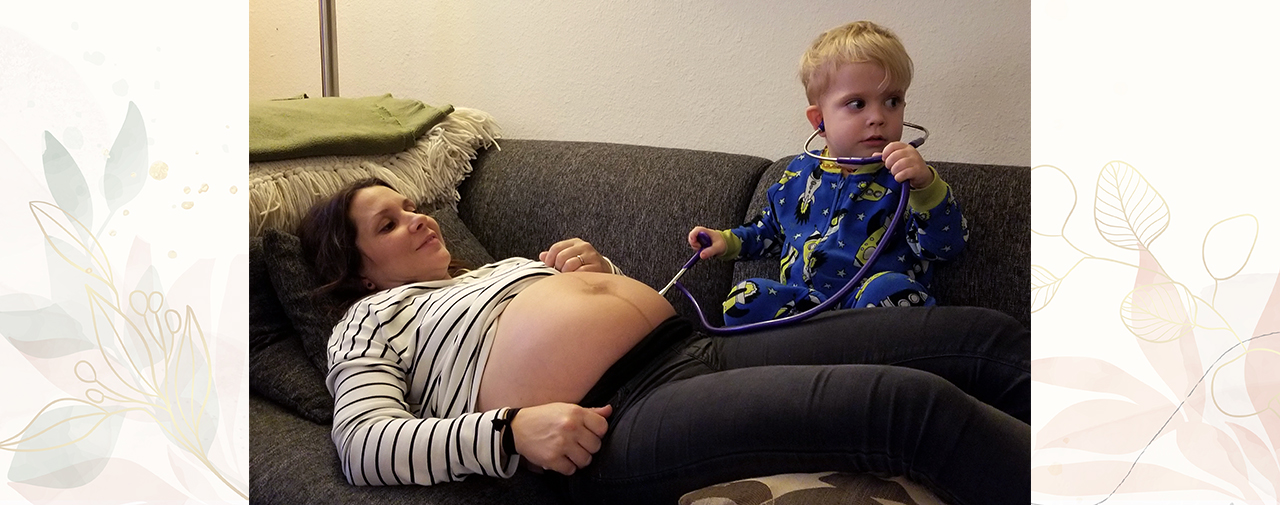 Mother Lying on couch with Child waiting